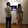 People looking at an exhibition 