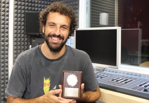 Yiannis Christidis with his award at CUT Radio in Cyprus